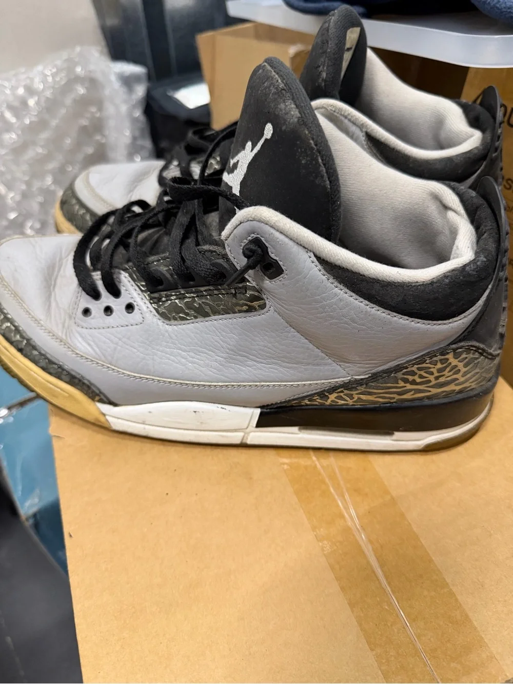 Air Jordans Black and White High-Top Sneakers with Grey Accents